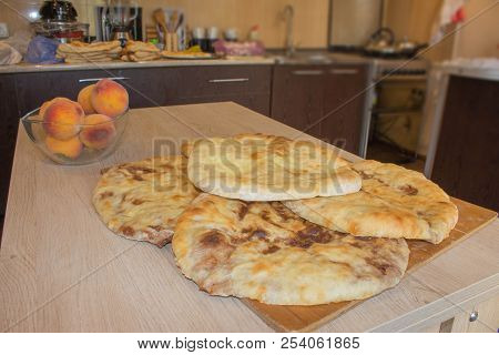 Homemade Baking Traditional Georgian Bread - Bean Pie Lobiani With Beans On The Wooden Table. Food B