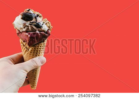 The Girl Is Holding A Delicious Ice Cream In Her Hand In A Minimal Style On A Redbackground. Summer 