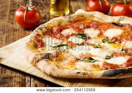Homemade Pizza Naples Style With Mozzarella And Basil