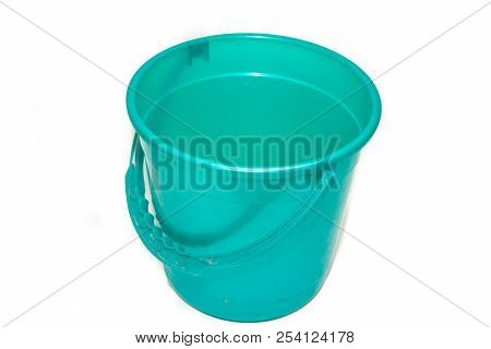 A Bucket On A White Background. Plastic Green Bucket On A White Background. Bucket For Washing Floor
