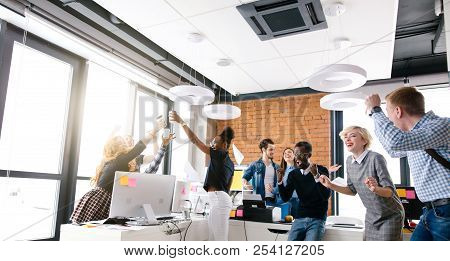 Cheerful Business People In Smart Casual Wear Express Positive Feelings