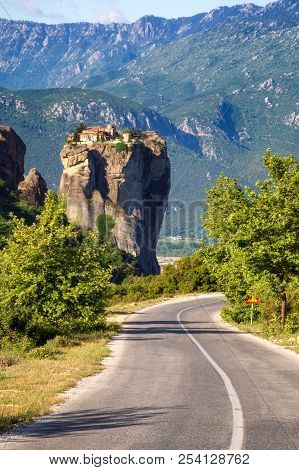Road Through The Landscape Of Meteora In The Pindos Mountains, Greece