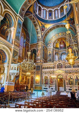 Athens, Greece - June 30, 2018. Orthodox Priests Celebrating The Divine Liturgy In The Metropolitan 
