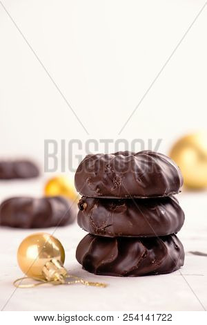 Three Dark Chocolate-coated Zefir Top View Isolated On White Background
