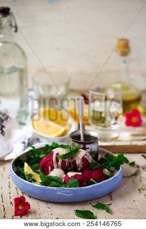 Beet Falafel With Tahina  Sauce And Green . Salad Selective Focus