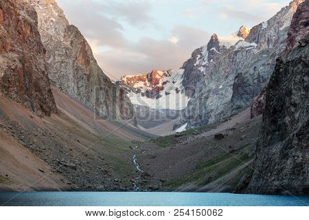 Beautiful serene lake in  Fann mountains (branch of Pamir) in Tajikistan.
