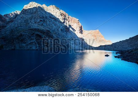Beautiful serene lake in  Fann mountains (branch of Pamir) in Tajikistan.