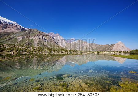 Beautiful serene lake in  Fann mountains (branch of Pamir) in Tajikistan.
