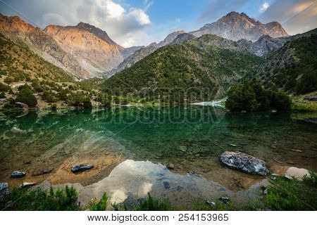 Beautiful serene lake in  Fann mountains (branch of Pamir) in Tajikistan.