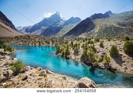 Beautiful serene lake in  Fann mountains (branch of Pamir) in Tajikistan.