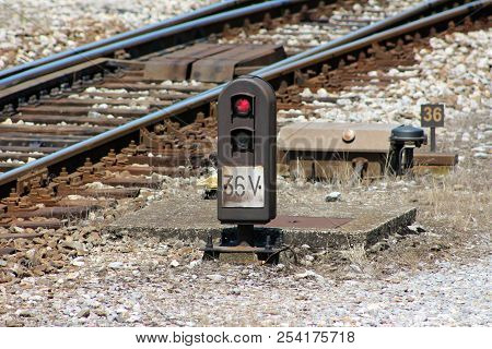 Railway Trackside Traffic Signal Light With Position Number Marker Mounted On Steel Plate And Concre