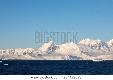 Ice In The Antarctica With Iceberg In The Ocean