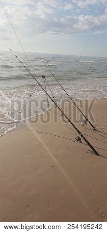 Fishing Rods In The Baltic Sea Beach