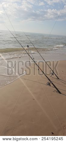 Fishing Rods In The Baltic Sea Beach