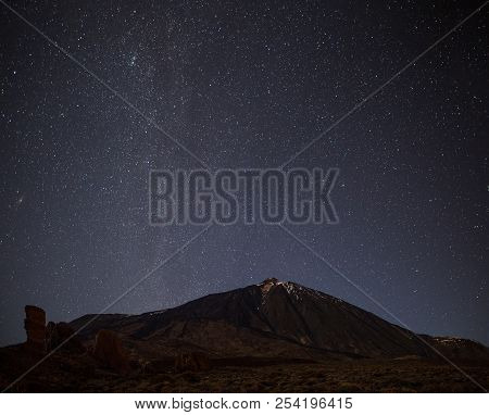 Night Sky With Shiny Stars Above Volcano El Teide. Milky Way. Night In The Teide National Park, Tene