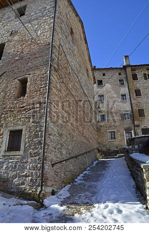 A Street In The Hill Village Of Casso In Winter Friuli Venezia Giulia, North East Italy. With A Popu