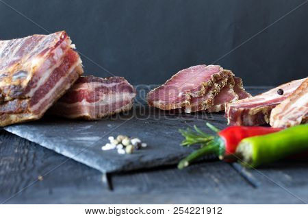 Pieces Of Dried Meat. Dried Bacon. Jerky Meat At Home.