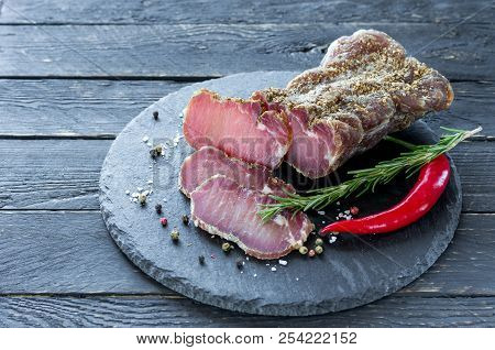 Meat And A Variety Of Peppers. Meat On A Shale Tray.