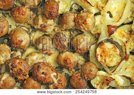 Fried Champignons In A Frying Pan. Delicious Fried Mushrooms Champignons In Frying Pan. Top View, Fl