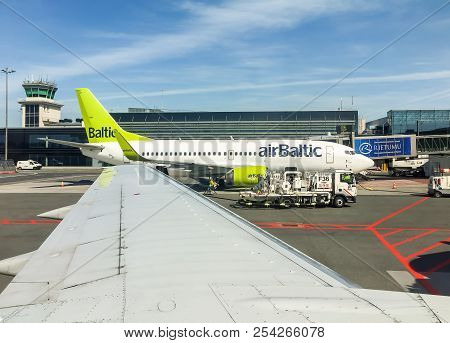 Riga, Latvia - May 5, 2018: Airbaltic Aircraft Preparation For Departure In The Riga International A
