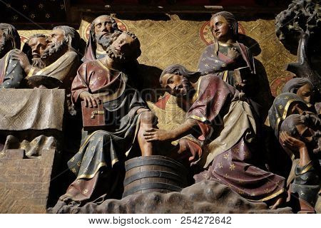 PARIS, FRANCE - JANUARY 04, 2018: Intricately carved and painted frieze inside Notre Dame Cathedral depicting Jesus Washing The Feet Of St. Peter, Palm Sunday, UNESCO World Heritage Site in Paris.