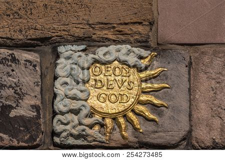 Edinburgh, Scotland, Uk - June 13, 2012: Closeup Of Golden Sun, Named God And Deus, On Facade Of Joh
