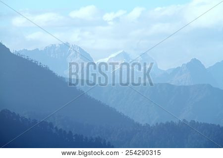 Morning Mountain Landscape With Layer Of Mountain Peaks Covered With Coniferous Deciduous Forests. V