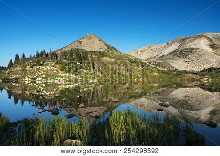 Sugarloaf Mountain And Medicine Bow Peak Reflected In Libby Lake  In Medicine Bow National Forest In