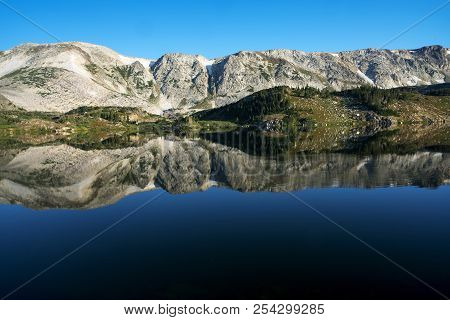 Sugarloaf Mountain And Medicine Bow Peak Reflected In Libby Lake  In Medicine Bow National Forest In