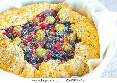 Summer Crostata Or Galette Pie With Fresh Garden Berries