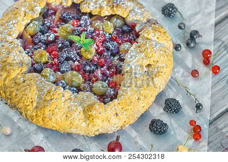 Summer Crostata Or Galette Pie With Fresh Garden Berries