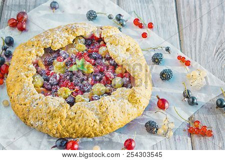 Summer Crostata Or Galette Pie With Fresh Garden Berries