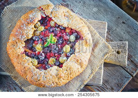 Summer Crostata Or Galette Pie With Fresh Garden Berries