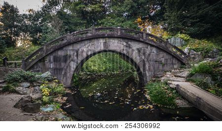 Ancient Stone Bridge At The Park