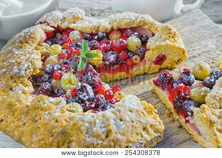 Summer Crostata Or Galette Pie With Fresh Garden Berries