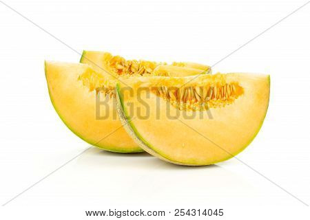 Group Of Three Slices Of Fresh Melon Cantaloupe Variety Isolated On White Background