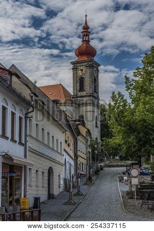 Old Church In Becov Nad Teplou Town In Hot Summer Cloudy Morning