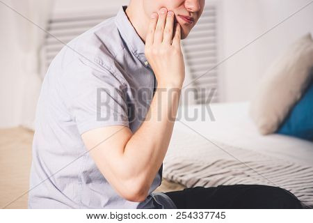 Man Suffering From A Toothache At Home, Wisdom Tooth Pain