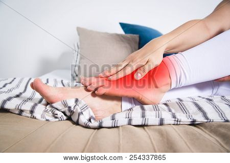 Woman's Leg Hurts, Pain In The Foot, Massage Of Female Feet