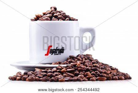 Composition With Cup And Beans Of Segafredo Zanetti Coffee