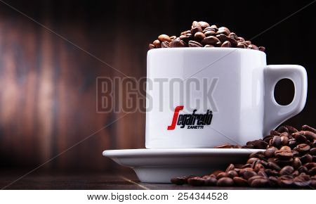 Composition With Cup And Beans Of Segafredo Zanetti Coffee