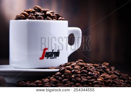 Composition With Cup And Beans Of Segafredo Zanetti Coffee