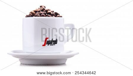 Composition With Cup And Beans Of Segafredo Zanetti Coffee