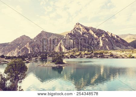 Beautiful serene lake in  Fann mountains (branch of Pamir) in Tajikistan.