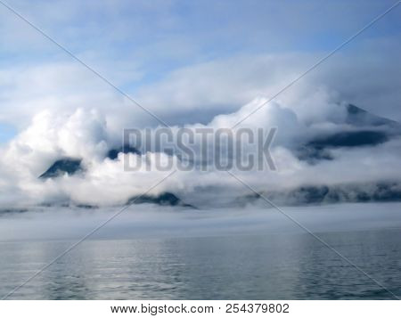Cotton Ball Clouds Over Valdez Bay