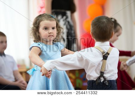 Belarus, Gomel, May 24 2018. The Kindergarten Is Central. Open Day.little Girl And Boy Dancing On Th