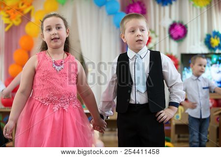 Belarus, Gomel, May 24 2018. The Kindergarten Is Central. Open Day.little Girl And Boy Dancing On Th