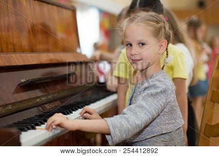 Belarus, Gomel, May 29, 2018. The Kindergarten Is Central. Open Day.child Plays The Piano.preschool 