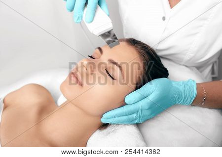 Beautiful Woman Receiving Ultrasound Cavitation Facial Peeling