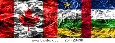 Canada Vs Central African Republic Smoke Flags Placed Side By Side. Canadian And Central African Rep